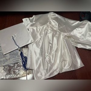 Graduation gown , cap and tassel white